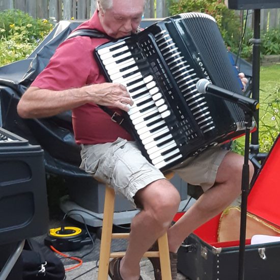 Terry playing at outdoor summer event